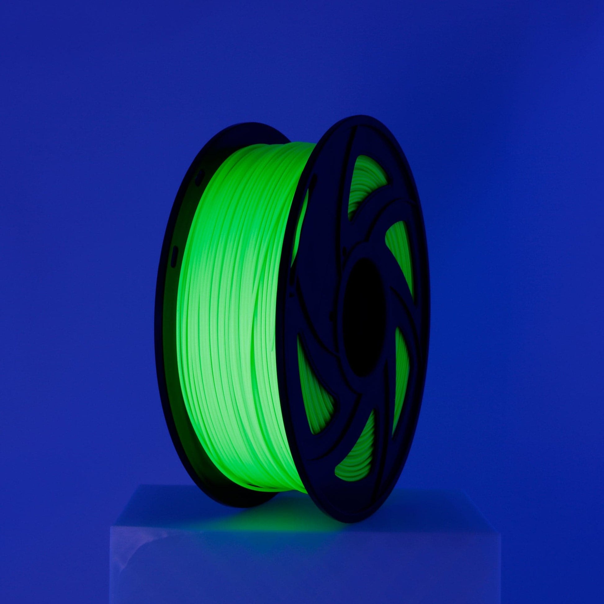 Fluorescent Green PETG Filament Spool 1.75mm 1kg shown under UV light