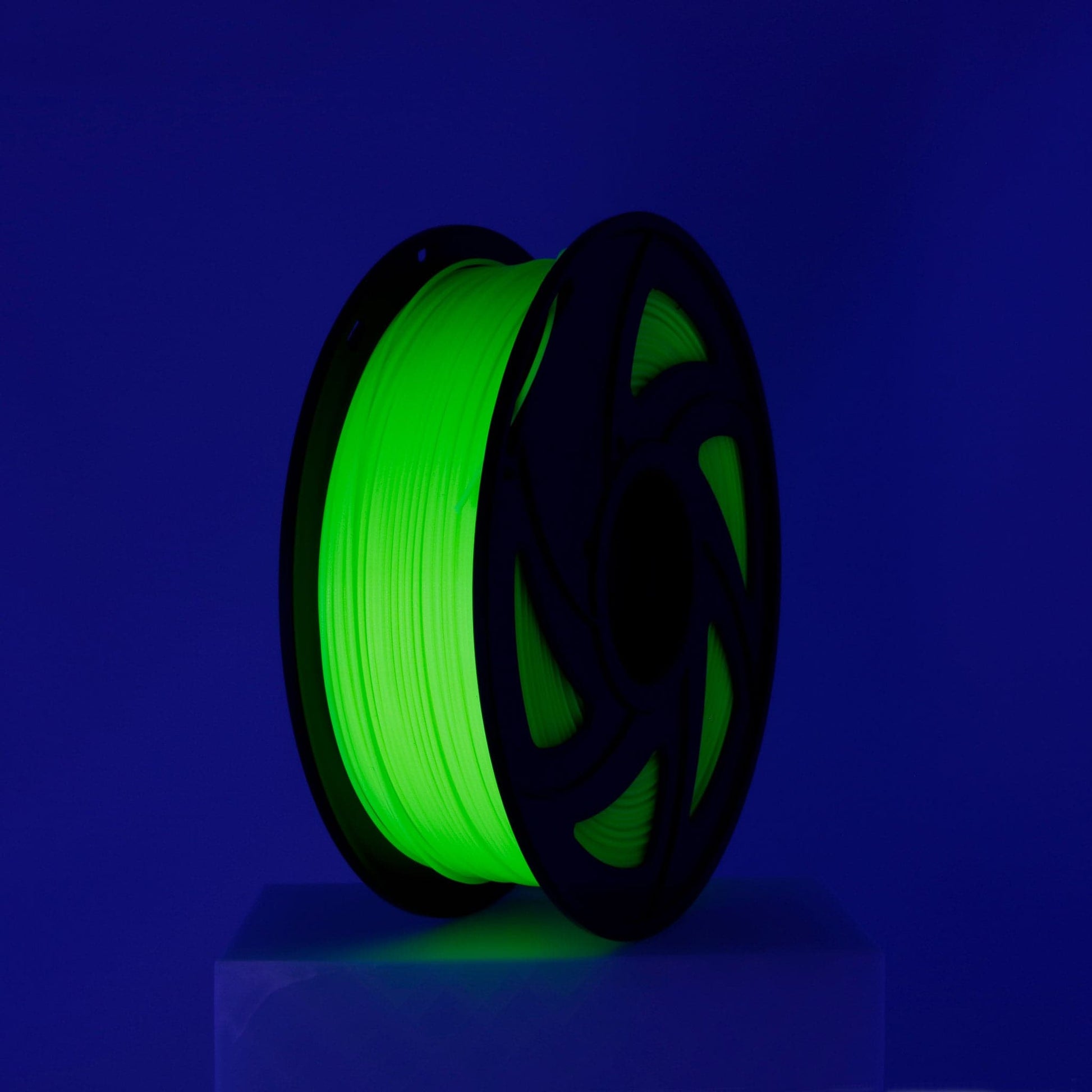 Fluorescent Yellow PETG Filament 1.75mm shown under UV lights
